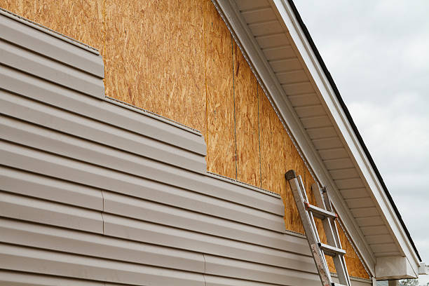 Professional Vinyl Siding technician working in Creighton, PA